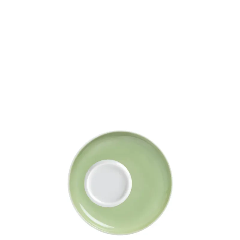 Eine runde, flache Untertasse in zartem Grün mit einem weißen, kreisförmigen Innenteil. Die Untertasse ist minimalistisch gestaltet und hat einen glatten, glänzenden Finish. Der Hintergrund ist neutral und hebt die Farben der Untertasse hervor.